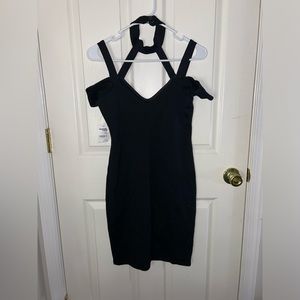 Woman’s black cocktail dress